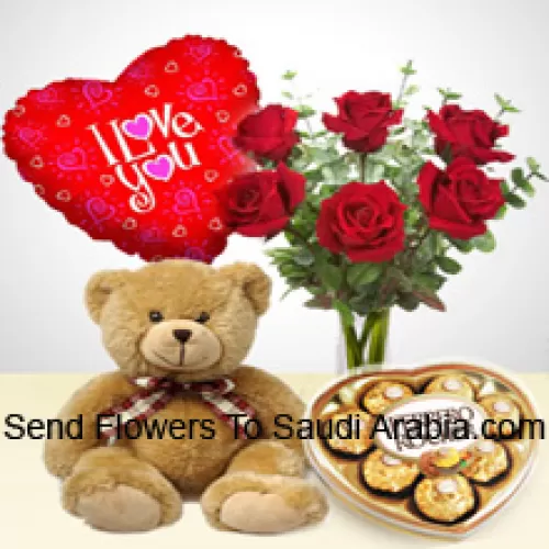6 Roses rouges avec quelques fougères dans un vase en verre, un mignon ours en peluche brun de 14 pouces de haut, 8 chocolats Ferrero Rocher en forme de cœur et un ballon "Je t'aime"