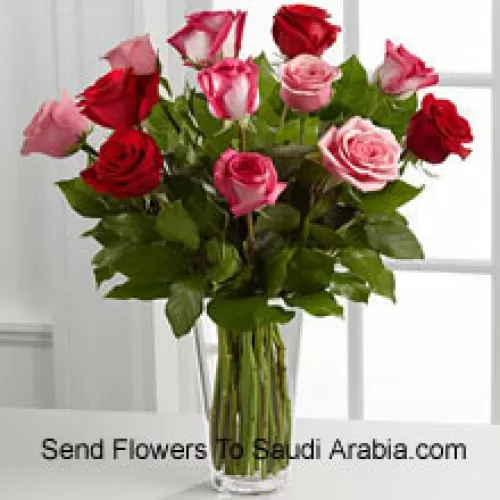 4 Red, 4 Pink And 4 Dual Toned Roses With Seasonal Fillers In A Glass Vase