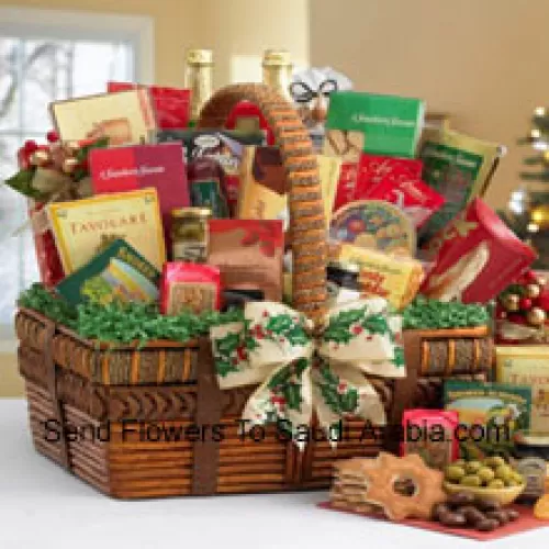 Send your love with this impressive gift basket that's all decked out for the EID. With the artful details of the handsomely crafted basket and the world of fancy flavors nestled inside, it festively captures the spirit of the season. The small includes a bountiful assortment with Tomato Basil Pretzels, Gingerbread Cake, Zesty Cheddar Thins, Spanish Olives, Pecan Pralines, Gouda Cheese Biscuits, Cinnamon Star Cookies, Belgian Chocolate Petites, California Smoked Almonds, Rothschild Triple Berry Preserves, Chocolate Chip Cookies, Ashby Assam Tea, Savory Snack Mix, Fruit Bonbons, Blend Coffee, and Godiva Milk Chocolate Strawberries. (Please Note That We Reserve The Right To Substitute Any Product With A Suitable Product Of Equal Value In Case Of Non-Availability Of A Certain Product)
